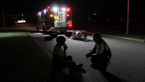 image of an ambulance driving away