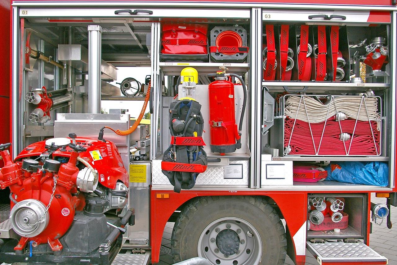 image of an open fire engine with gear on display