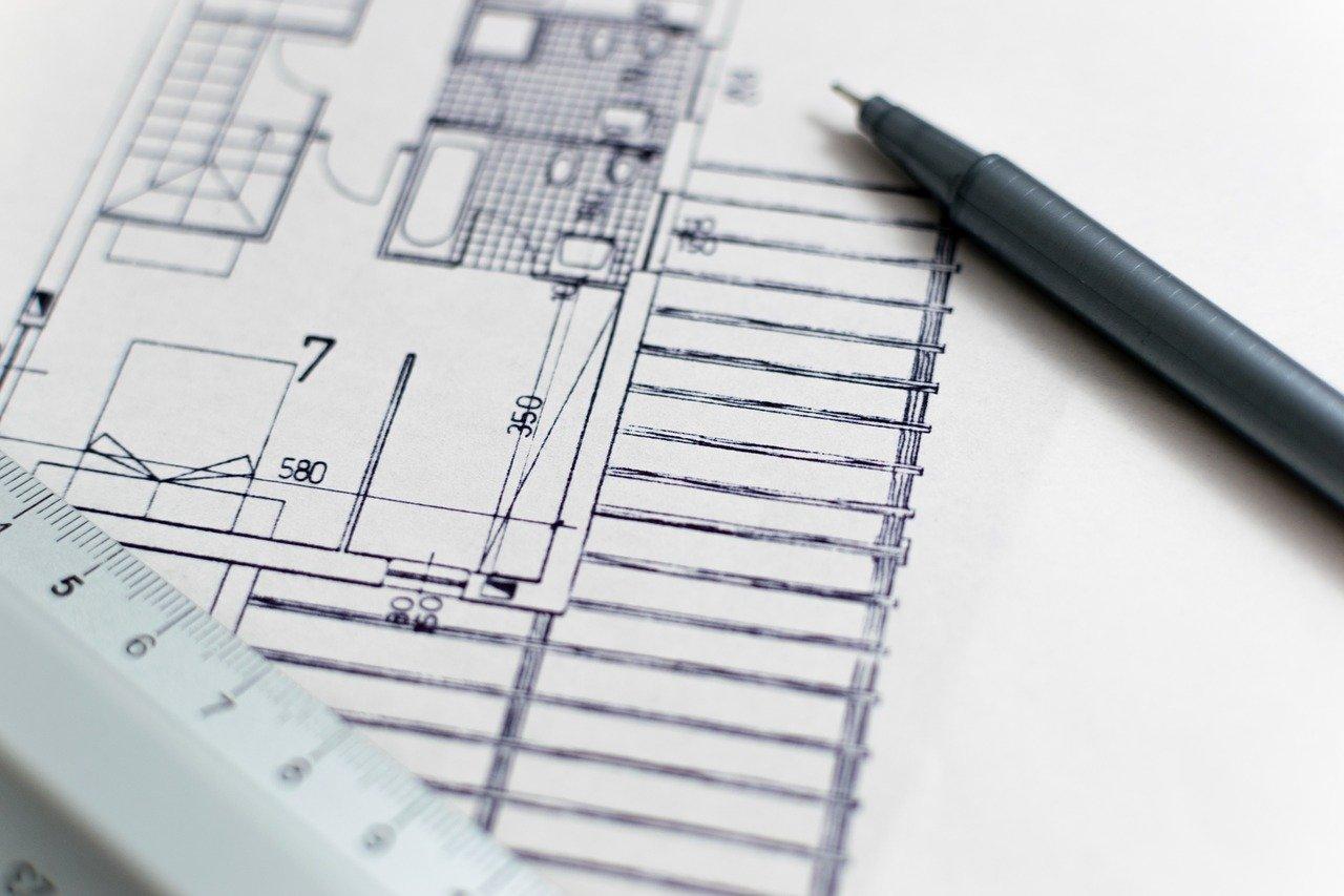 Image of a ruler, pen and blueprint courtesy of Pixabay