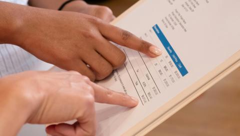 Image of two people pointing at a document courtesy of Kindel Media under Pexels free use images